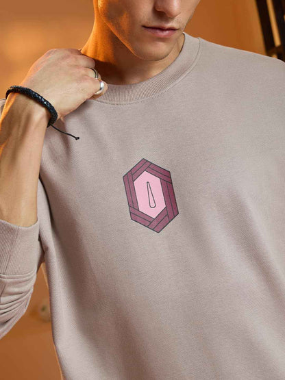 Beige Demon Slayer Giyu T-shirt featuring a small geometric emblem on chest worn by male model