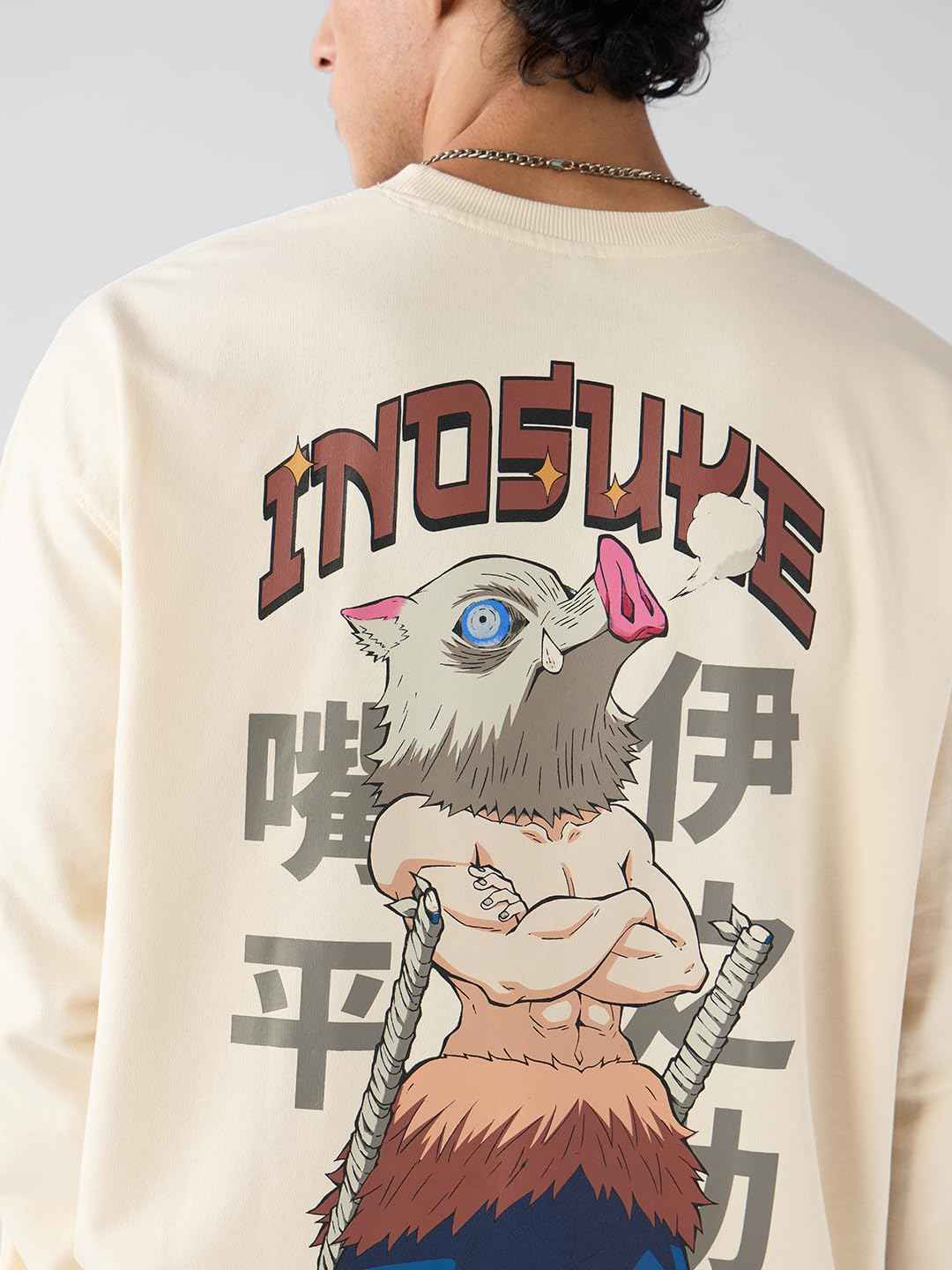 Beige Demon Slayer Inosuke t-shirt featuring muscular character with boar mask and crossed arms