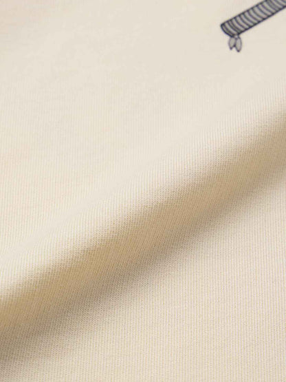 Close-up view of cream fabric texture on Demon Slayer Inosuke t-shirt from The Souled Store