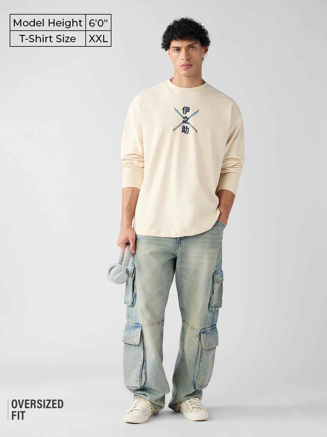 Model wearing oversized fit Demon Slayer Inosuke t-shirt in beige with Japanese character print