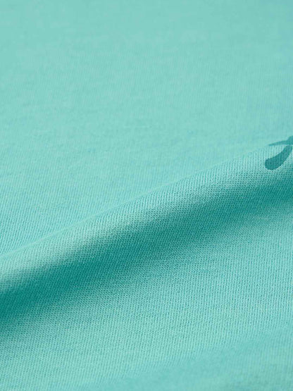 Close-up texture of fabric for Demon Slayer Muichiro T-shirt in light teal color from The Souled Store